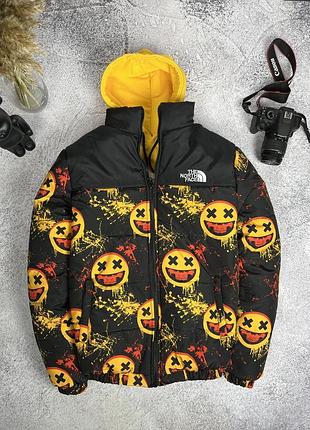 Чорна яскрава куртка tnf