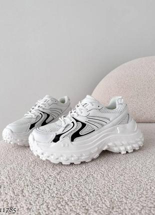 Натуральні шкіряні білі кросівки з текстильними вставками2 фото