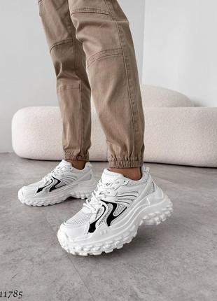 Натуральні шкіряні білі кросівки з текстильними вставками7 фото