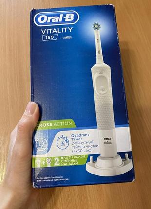 Электрическая зубная щетка braun oral-b vitality2 фото