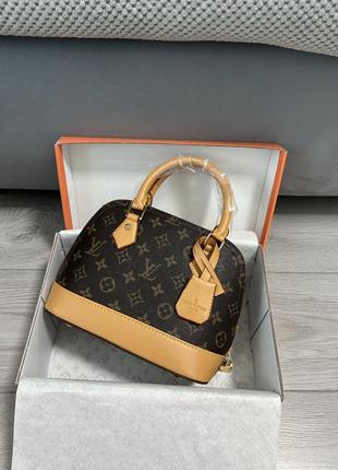 Сумка в стилі louis vuitton
