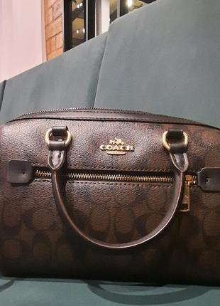 Продам кожаную женскую сумку стиль coach signature rowan