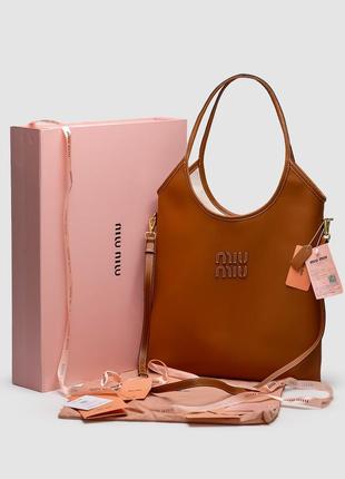 miu Leder miu Leder Eyewear Délice cat eye sunglasses