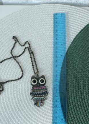 Підвіска з симпатичним кулоном-совою.
