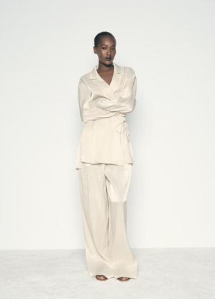 Жаті штани блискучі бежеві zara new