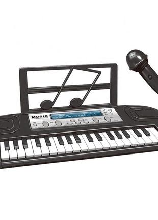 Синтезатор із мікрофоном для дітей
