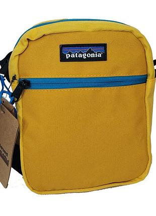 Сумка мессенджер patagonia колір жовтий