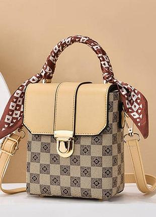 Женская маленькая сумочка-бочечка на плечо, минисумка на замочку светлый с бежевым