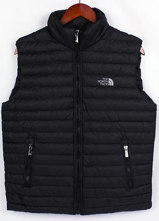 Жилетка the north face тонка, колір чорний, різні розміри