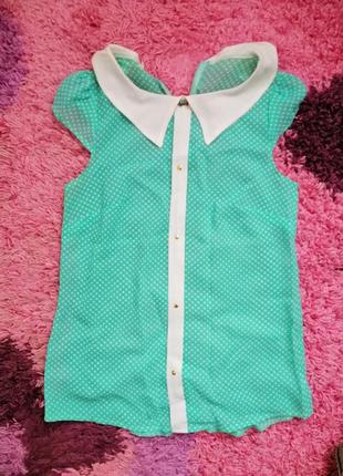 Продается зеленая блузка без рукавов