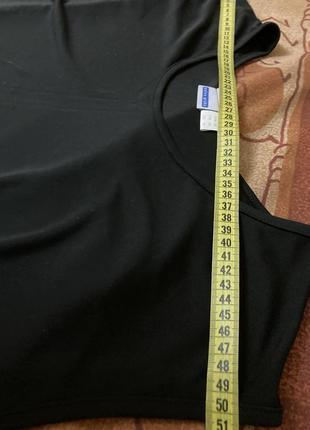 Якісна базова блуза насиченого чорного кольору10 фото
