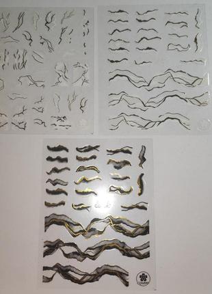 Наліпки слайдери для нігтів мармур золотий білий чорний декор фольга абстрактні хвилясті лінії дизайн граффіті 3д5 фото