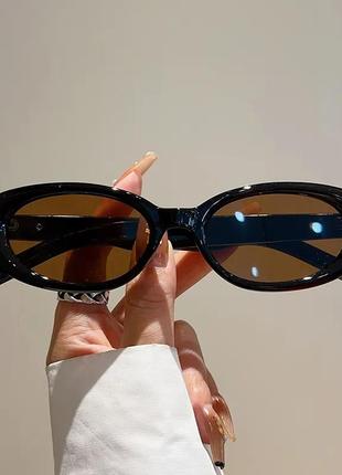 Трендові окуляри овальні сонцезахисні іузькі очки унісекс чорні коричневі нові3 фото