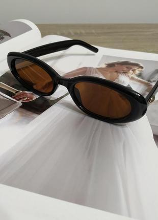 Трендові окуляри овальні сонцезахисні іузькі очки унісекс чорні коричневі нові5 фото
