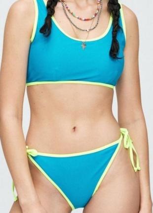 Яскравий новий неоновий купальник на зав'язках