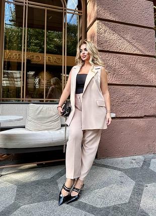 Брючний костюм штани на гудзику і блискавці та подовжена жилетка жилет