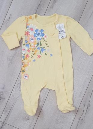 Чоловічок з яскравим квітковим малюнком