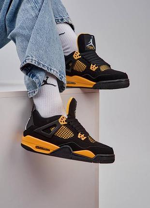 Кросівки чорні з жовтим чоловічі та жіночі розміри nike air jordan 4 retro thunder