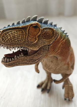 Фигурка динозавра tyrannosaurus rex schleich2 фото