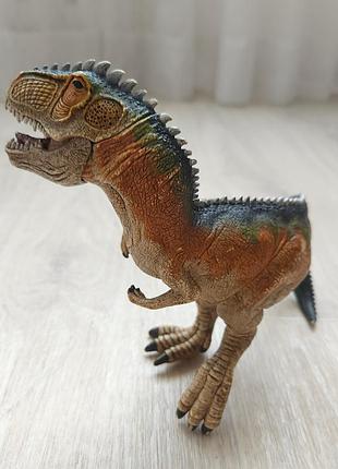 Фигурка динозавра tyrannosaurus rex schleich3 фото