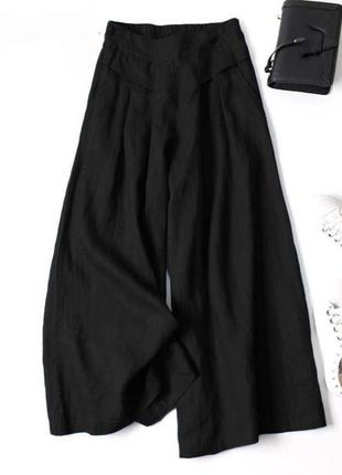 Брюки женские однотонные свободного кроя на высокой посадке с карманами качественные стильные черные4 фото