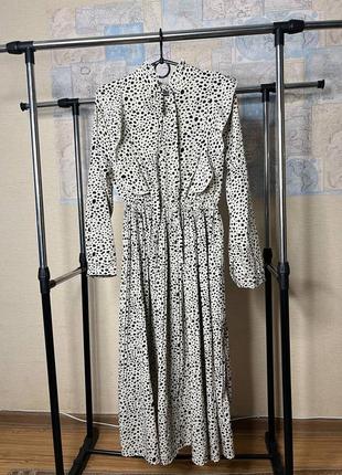 Елегантна сукня міді зі спідницею плісе