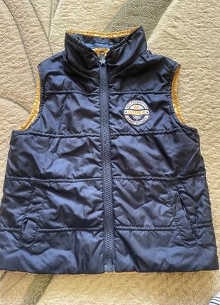 Двухсторонняя жилетка