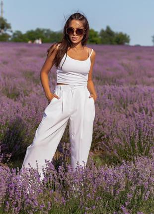 Білі котонові вільні брюки