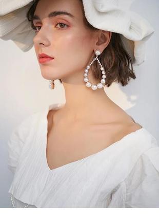 Сережки-капельки з білими перлинами для нареченої8 фото