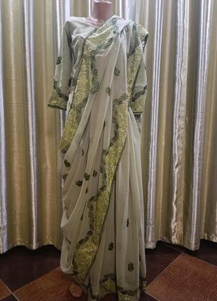 Красивое оливковое индийское сари с чоли