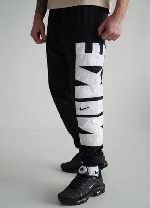 Nike<unk> штаны<unk> нейлоновые брюки<unk> нейлоновые брюки nike<unk> найк<unk> нейлоновые брюки найк<unk> nike нейлоновые брюки