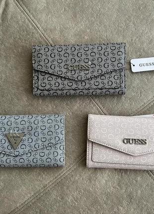 Жіночі гаманці guess