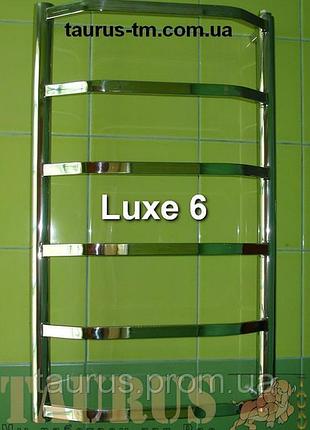 Полотенцесушитель широкий luxe 6 / 650х500 из нержавеющей стали с плоской перемычкой 20х10 изогнутой трапецией