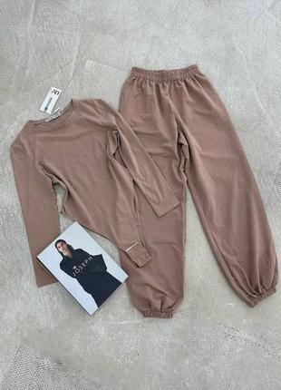 Спортивный костюм из боди