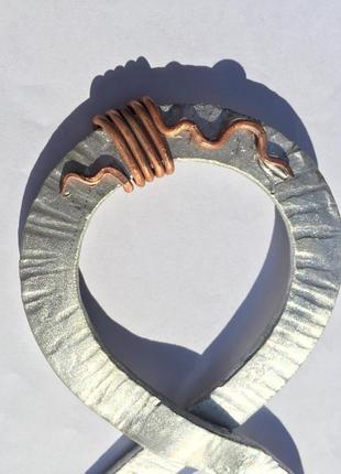 Знак бесконечности с сердцем