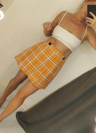 Яркая юбка в клетку