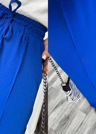 Свободные женские брюки из жатки на лето электик (размеры 42, 44, 46, 48, 50, 52)4 фото