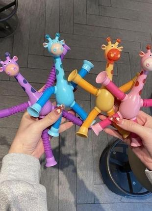 Иигрушка поп-тюб жираф