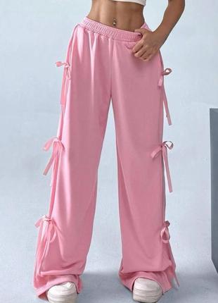 Штани з бантиками