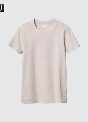 Футболка uniqlo бежевого кольору