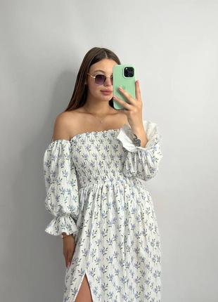 Жіноча сукня в довжині міді