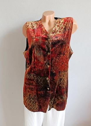 Камізелька подовжена із оксамиту.