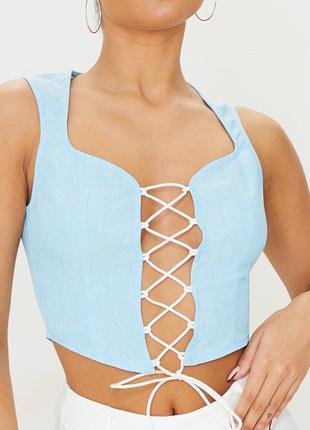 Кроп топ со шнуровкой на груди