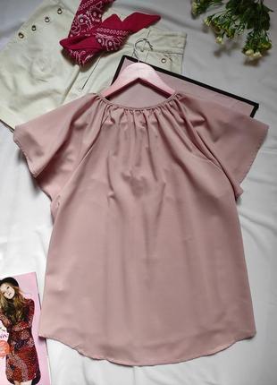 Ніжна блуза вільного крою кругла горловина на зав'язці короткі пишні рукава блузка пудрового кольору рожева3 фото