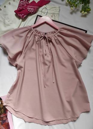 Ніжна блуза вільного крою кругла горловина на зав'язці короткі пишні рукава блузка пудрового кольору рожева7 фото