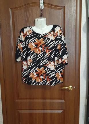 Трикотажная свободная блузка размера 50.1 фото