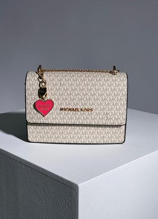 Сумка michael kors mini bag cream1 фото