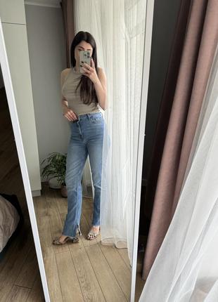 Джинсы с разрезом zara7 фото