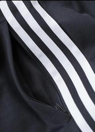 Спортивні широкі штани adidas yellow originals2 фото