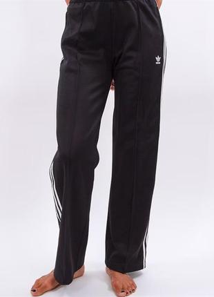 Спортивні широкі штани adidas yellow originals5 фото